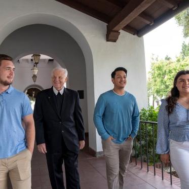 Br. Thomas walking with Gael students